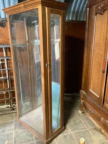 Lighted display cabinet with glass shelves image