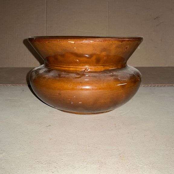 Brown pottery spittoon image