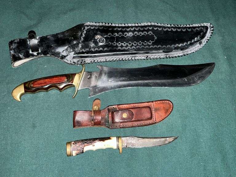 Schrade 153UH hunting knife with sheath and stone image