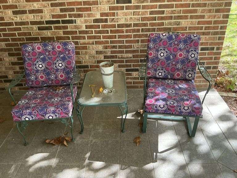 2 metal patio chairs with cushions image