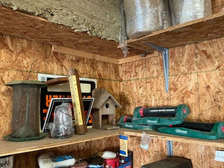 Bird feeders, 3 lawn sprinklers, bird house, etc. image