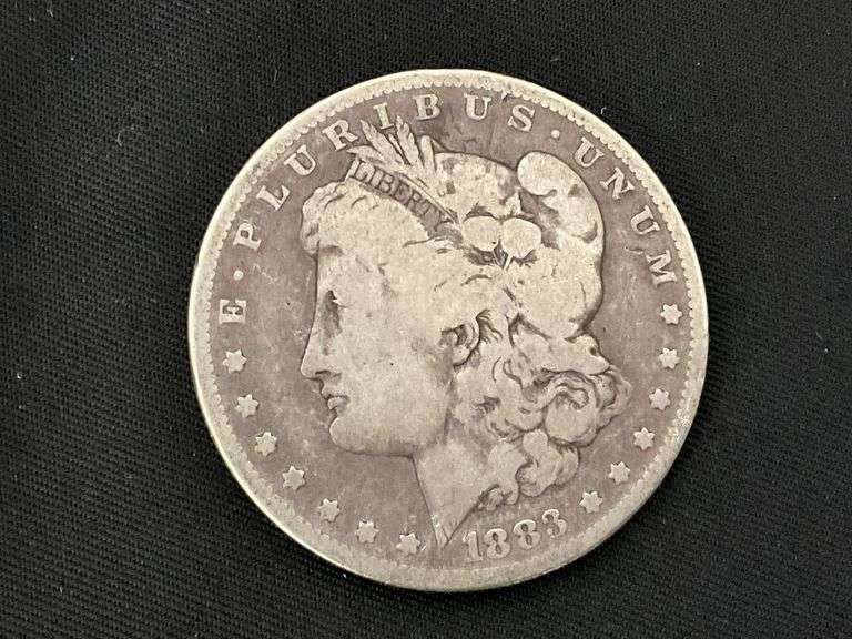 1883 Morgan silver dollar image