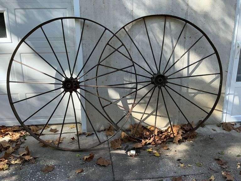 2 metal rake wheels with cast iron hubs image
