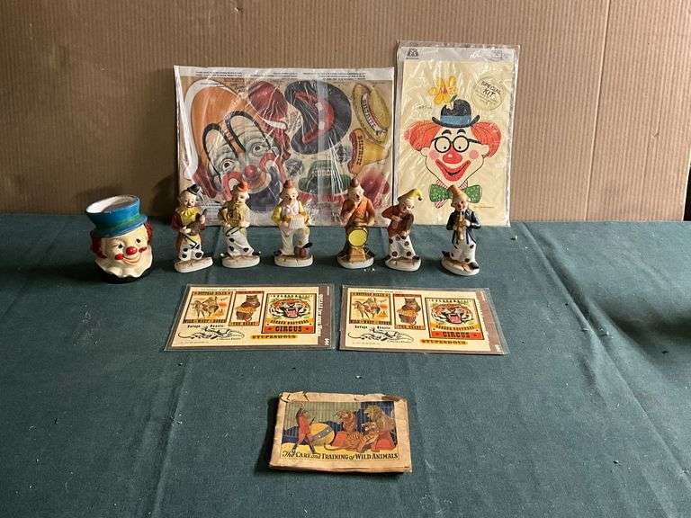 Clown figurines, paper dolls, vase, etc. image