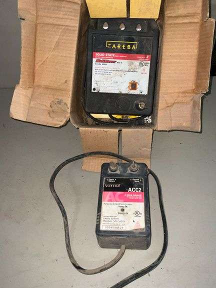 2 Zareba electric fence chargers image