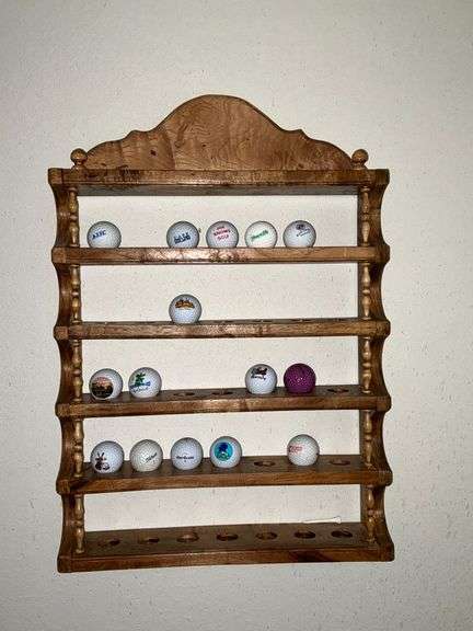 Golf ball display shelf with golf balls image