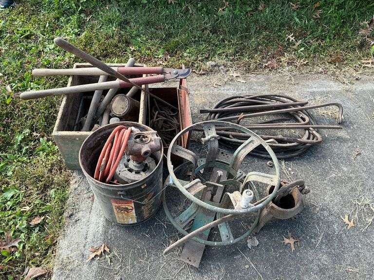 Crow bars, hammers, sausage stuffer, extension cord, etc. image