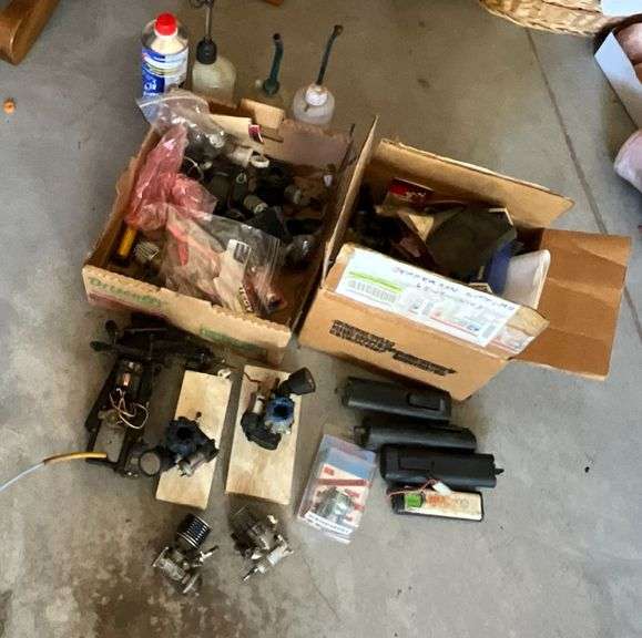 Assorted parts, fuel cans, starter, batteries, engine (unknown condition) image