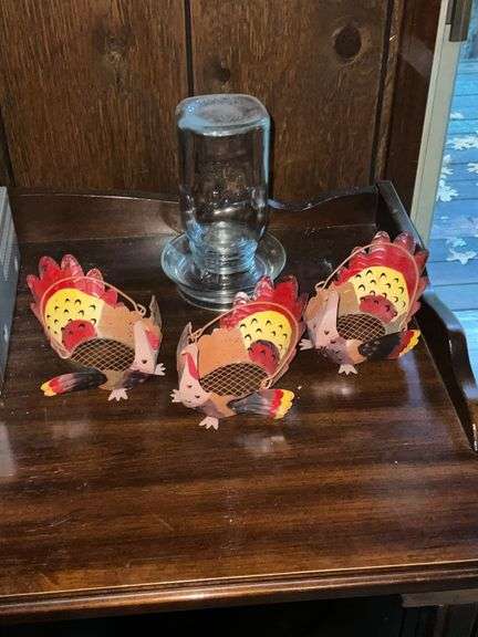 Glass chicken waterer, 3 metal turkey baskets. image