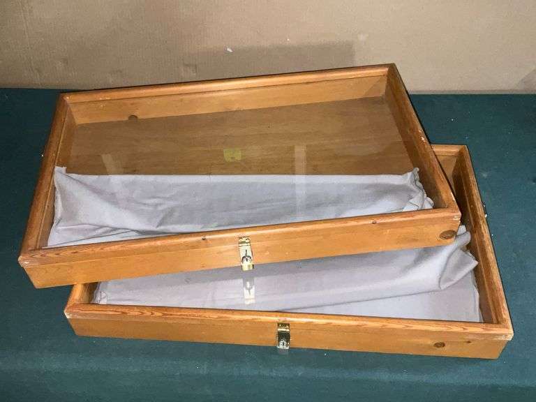 2 wooden display boxes with glass top image