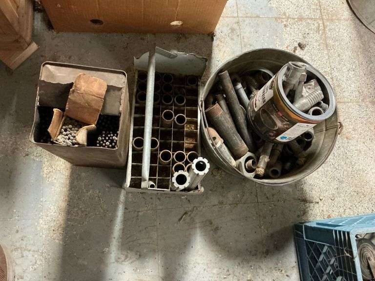 Pipe fittings in galvanized bucket, metal box of welding rods image