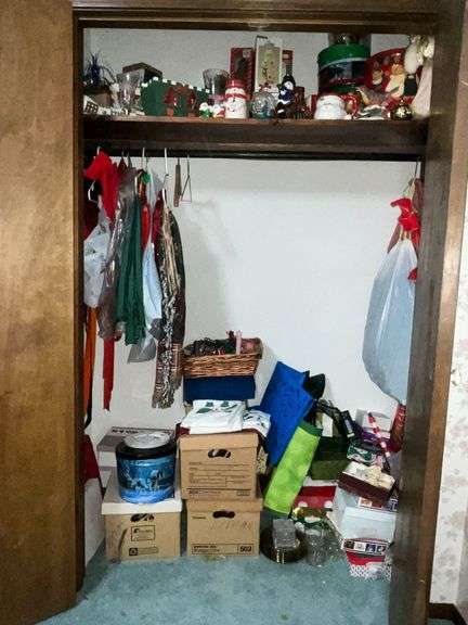 Closet of Christmas decorations, wrapping paper, gift bags image