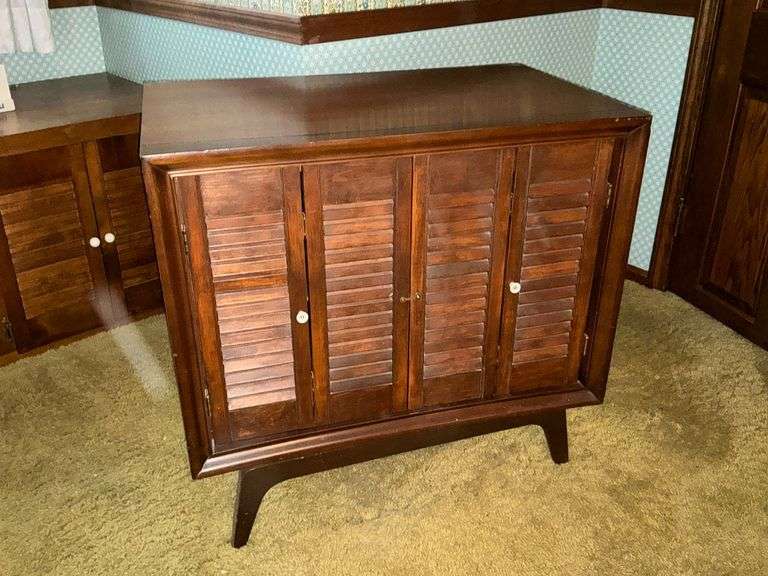 TV stand, swivel base, with 2 doors and shelves. image