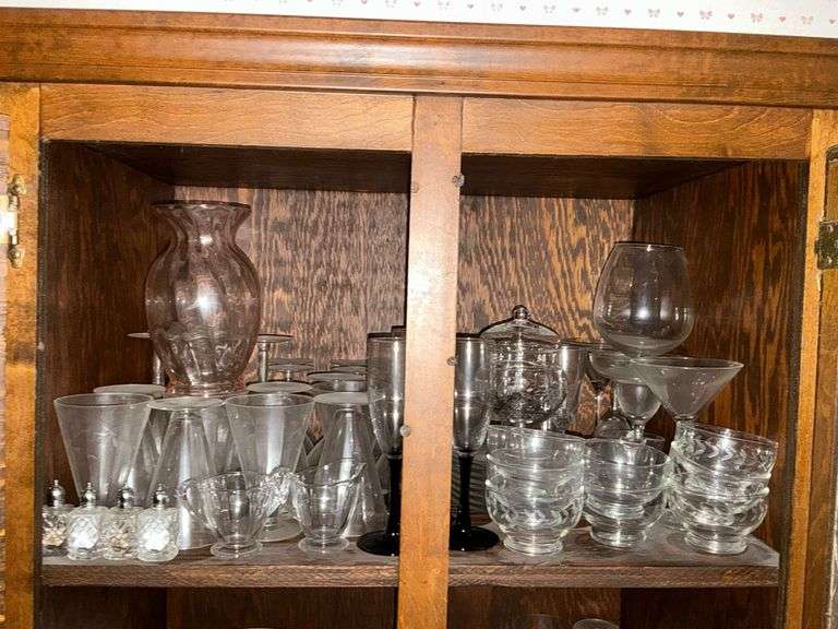 Wineglasses, sherbet dishes, salt & pepper shakers, cream and sugar, etc. image