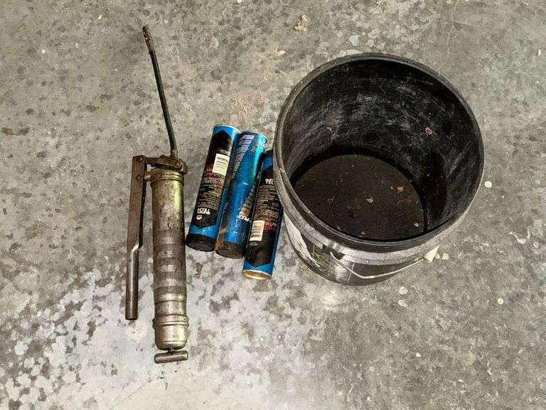 Grease gun with flex hose and bucket image