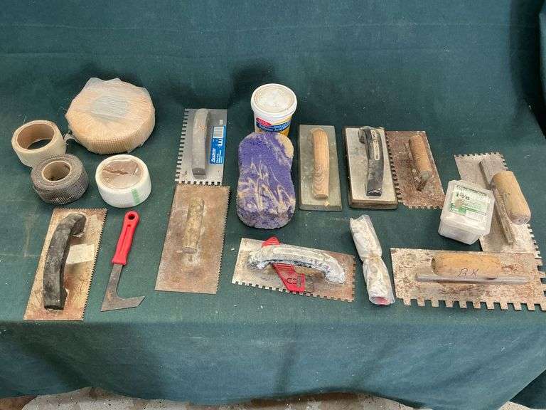 Assortment of masonry tools image