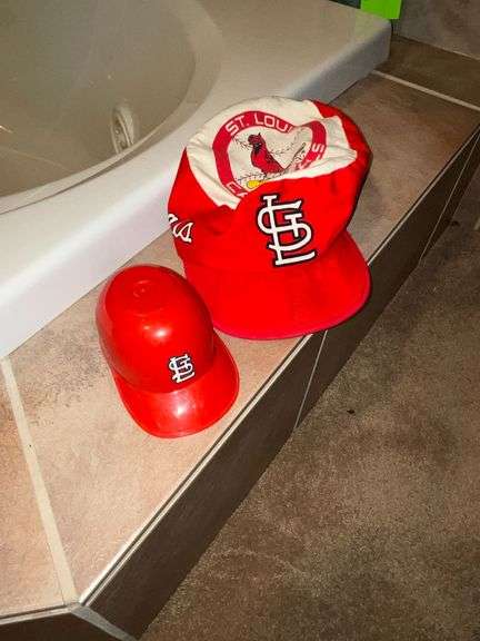 St. Louis Cardinals cap and mini helmet image