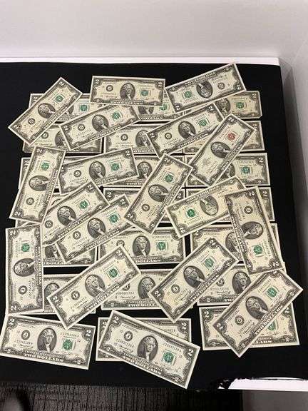 (39 +/-) $2 dollar bills image