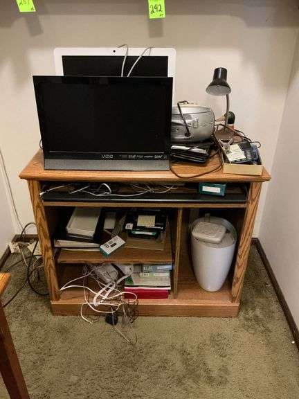 Vizio and HP monitors, telephones, office supplies, keyboard image