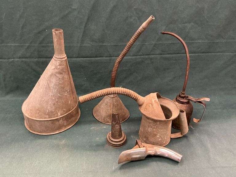 Assortment of oil cans, funnels, spouts, etc. image