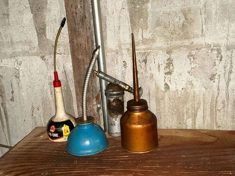 3 Oil cans, grease gun image