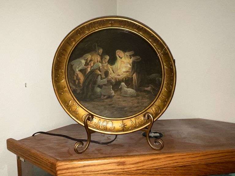 Lighted nativity scene on stand image