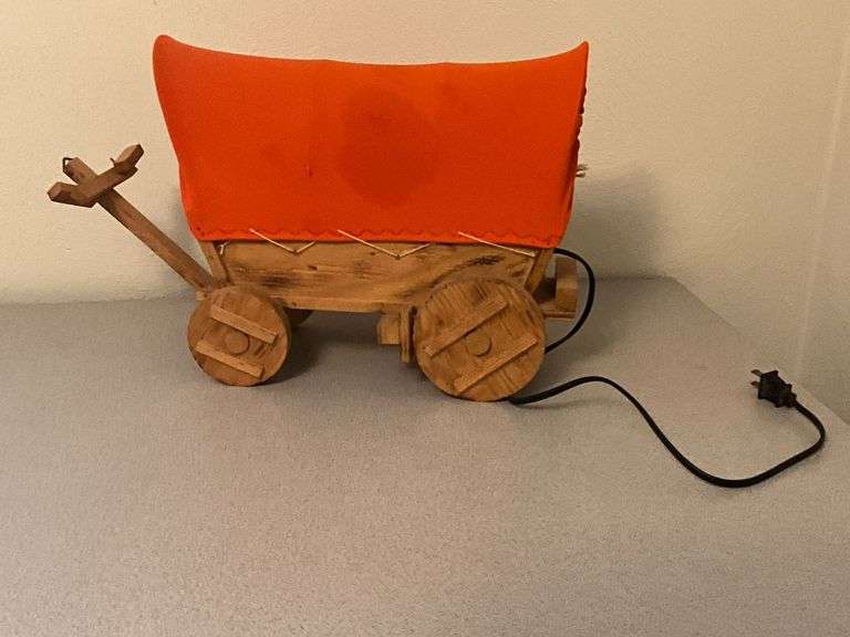 Lighted wooden covered wagon, 17" L x 11 1/2" T. image