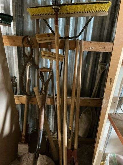 Long handled tools, leaf rake, brooms, shovels image