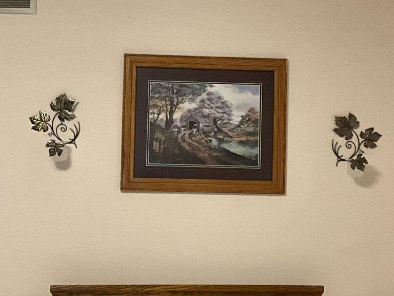 Framed artwork, candle holders image
