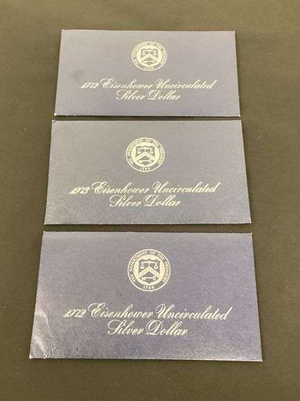 (2) 1972 and (1) 1973 Eisenhower Uncirculated silver dollars image