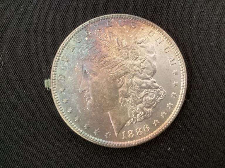 1886 Morgan silver dollar image