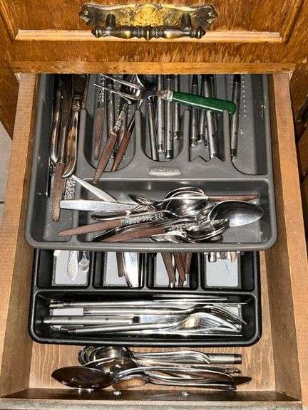 Assorted flatware with Rubbermaid trays image