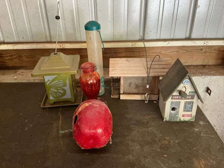 Assortment of bird feeders and houses image