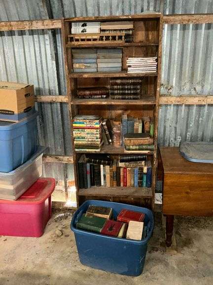 Bookshelf and assortment of books image