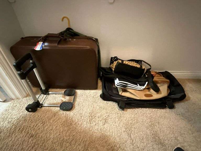 American Tourister suitcase, rolling duffle bag, luggage cart, etc. image