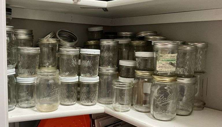 Canning jars, mostly jelly and pint. image