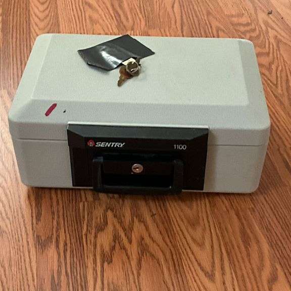 Sentry 1100 lock box with keys, rating class 350 degrees for half hour fire resistant image