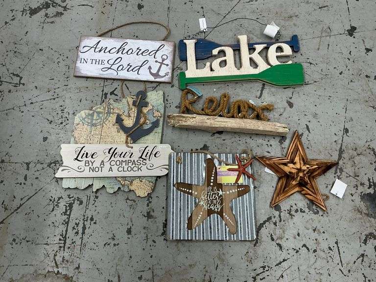 Assortment of metal and wood signs, lake and beach, etc. image