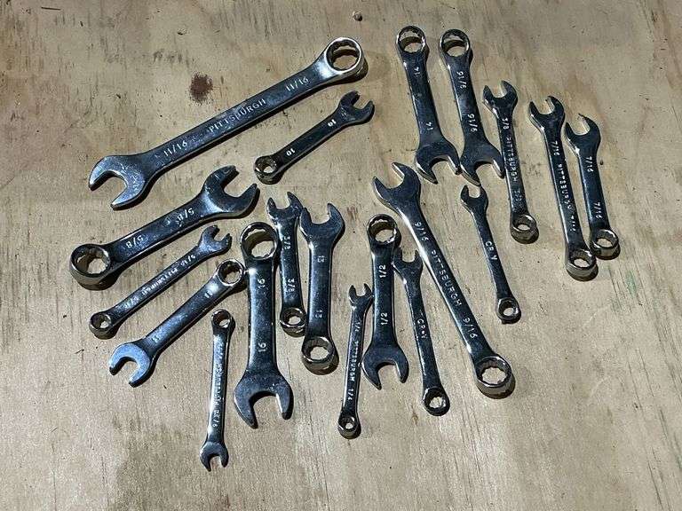 Assortment of stubby wrenches. image