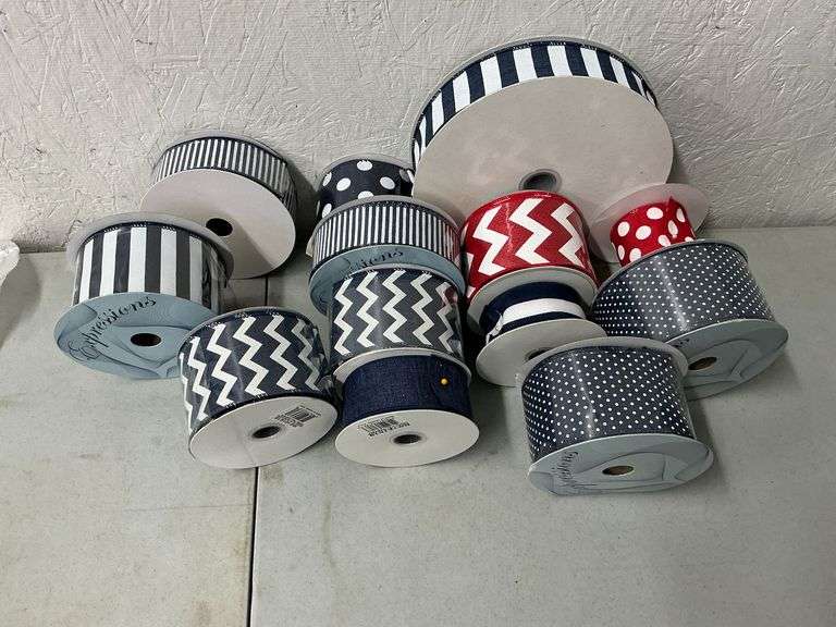 Rolls of blue, white and red wired decorative ribbon image