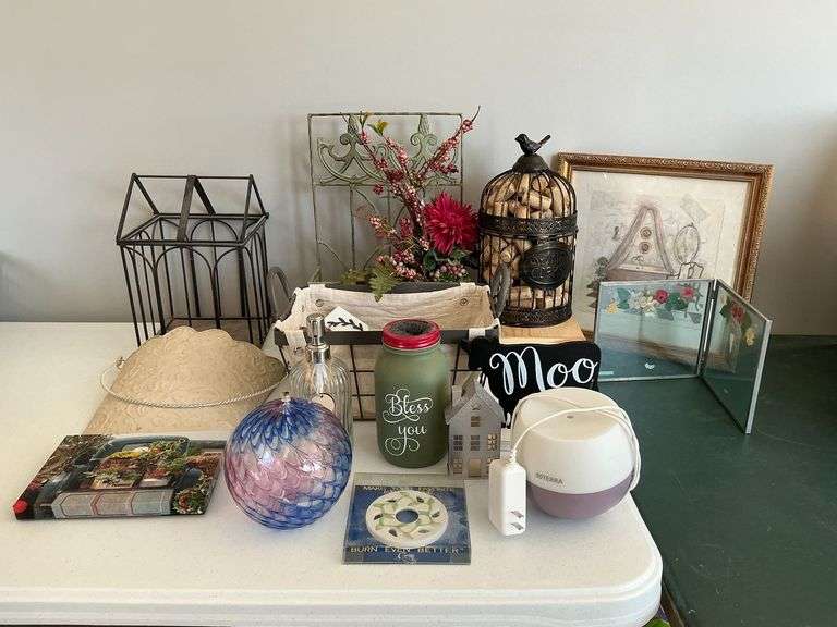 Decorative items. baskets, candles, prints image