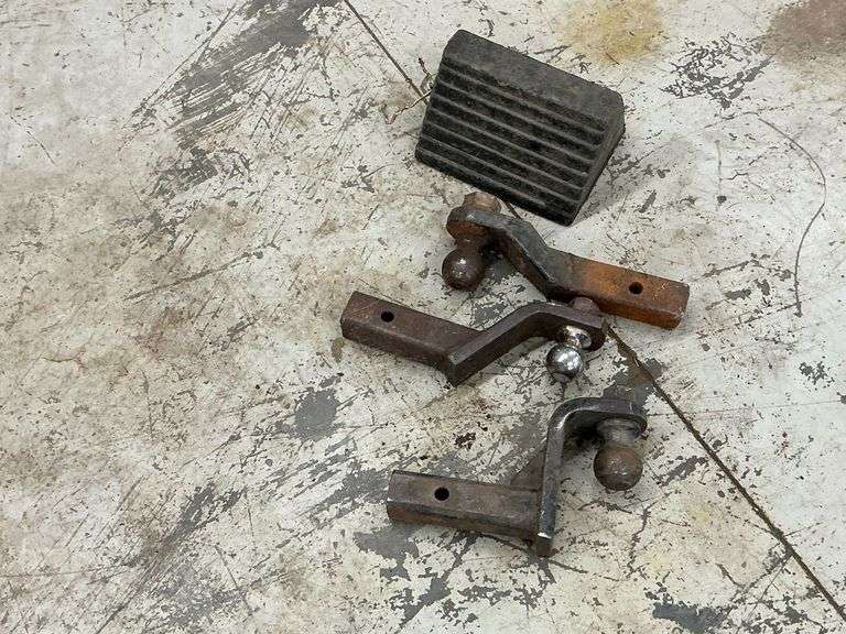 (2) 2 5/16" hitches, 2" hitch, trailer wheel chock. image