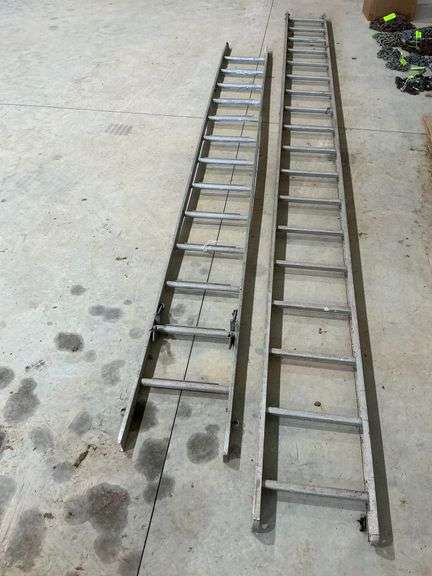 2 sections of aluminum extension ladders, non-matching image