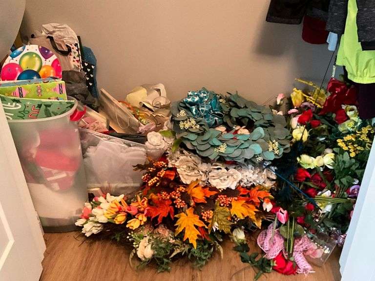 Large assortment of silk and artificial flowers, wreaths image