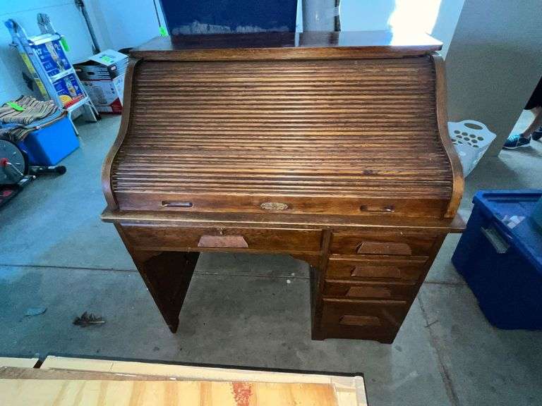 Antique S-curve roll top desk, large crack  in desk top, with key image
