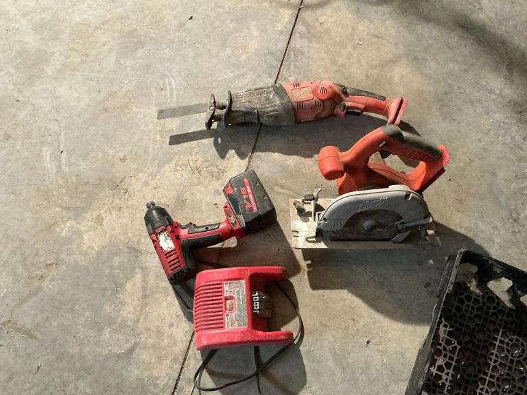 18 volt Milwaukee circular saw, 1/4" impact driver, charger, 18 volt battery image