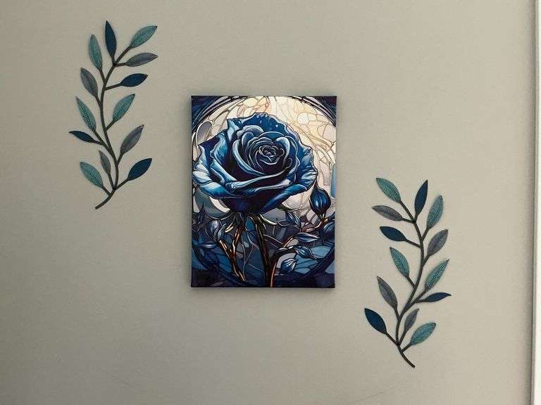 Floral oil on canvas, (2) 16" metal leaves image