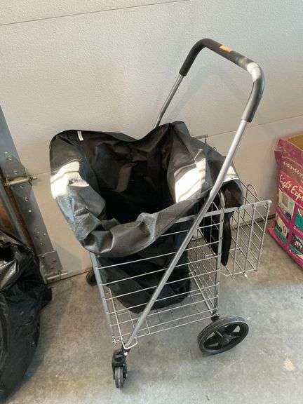 Folding shopping cart with bag liner. image