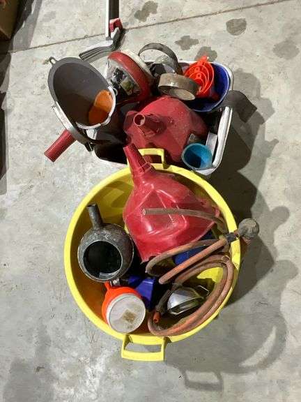 Large assortment of funnels, oil can, etc. image