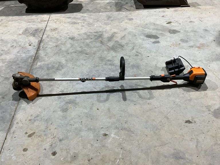 Worx 56V string trimmer, charger, battery, working condition image
